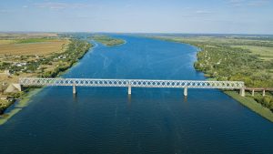 Russian invaders deal with damaged railway bridge near Kherson