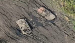 Russian BMPs get in a mine ambush by Ukrainian marines