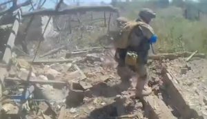 Soldiers of the Liut Brigade show the liberation of the village from the enemy