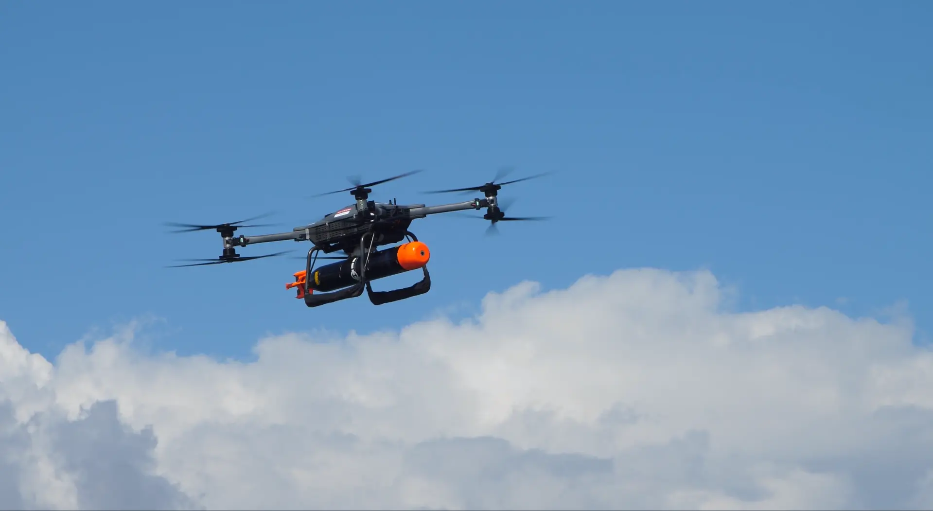 A heavy-lift unmanned aerial system demonstrated the capabilities to launch a torpedo