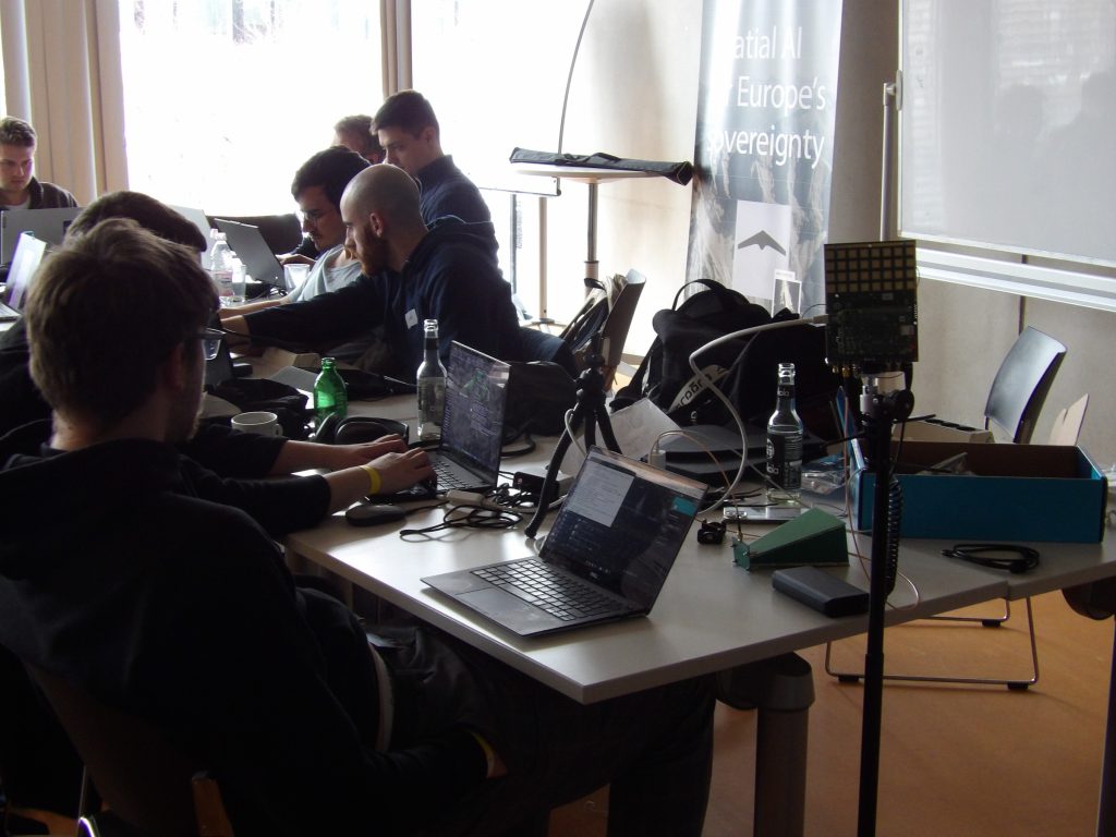 Одна з команд працює над проєктом під час European Defense Tech Hackathon (EDTH) у Мюнхені. Фото Мілітарний