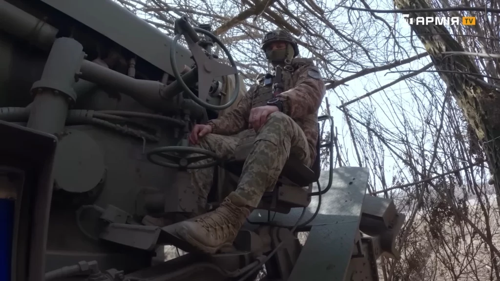 The senior navigator of the Bohdana self-propelled artillery system. March 2025, Ukraine. Photo credits: Army TV