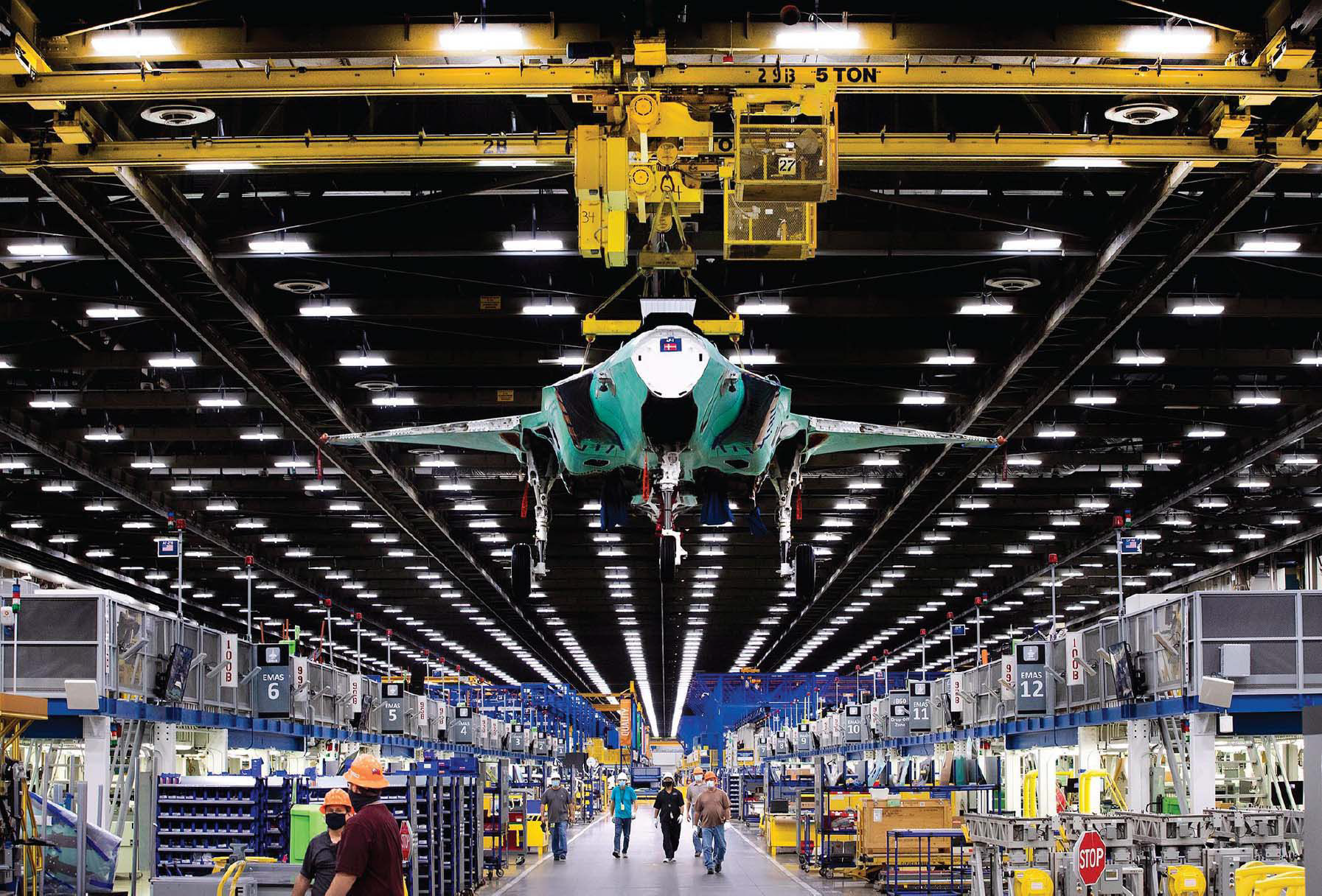 A Danish F-35 is lifted from one of the twelve assembly and connection stations at the Plant Fort Worth. Photo credits: Lockheed