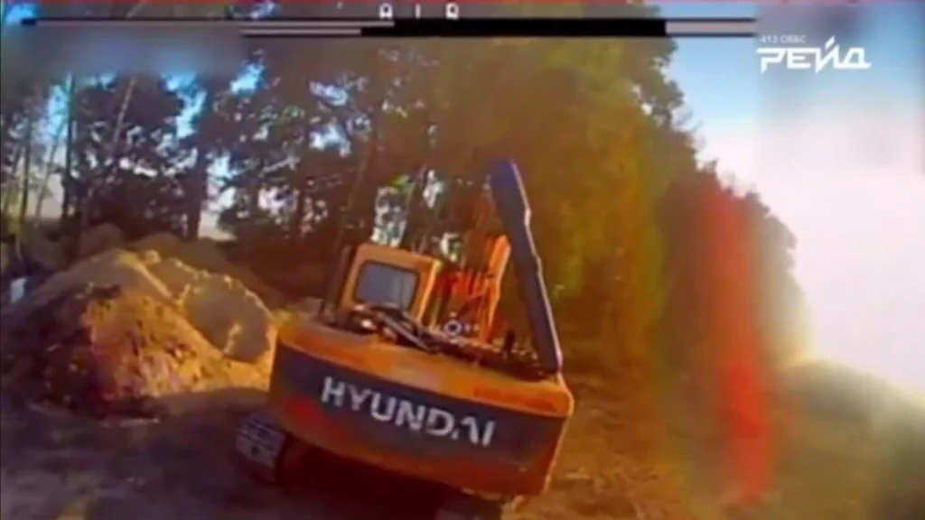Destruction of engineering equipment by an FPV drone launched from a carrier UAV. Screenshot from video by Vadym Sukharevskyi