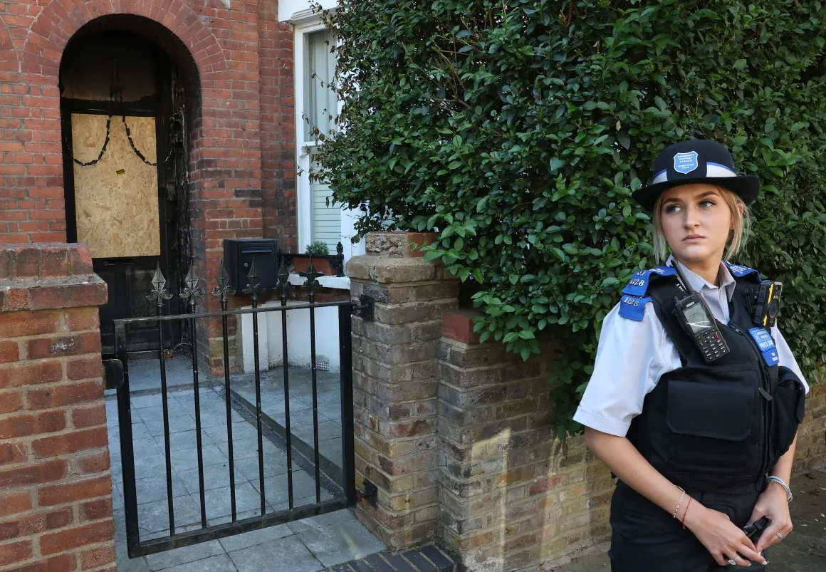 A police officer stands outside Prime Minister Keir Starmer’s home on May 13, 2025. Toby Melville/Reuters