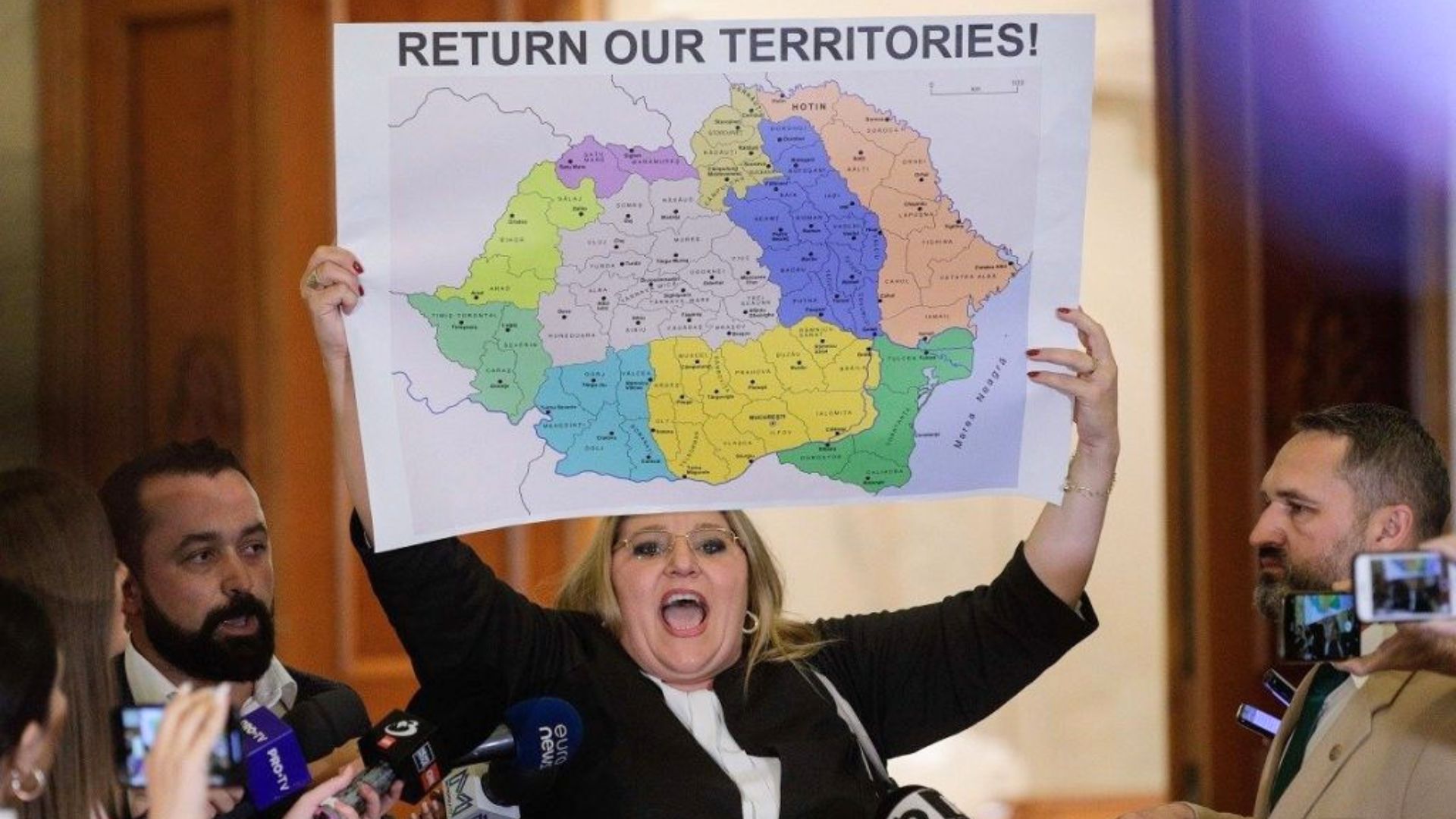 Romanian far-right politician Diana Șoșoacă with a map of “Greater Romania.” October 10, 2023.