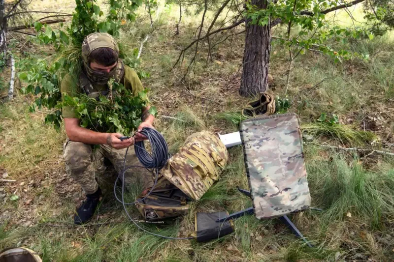 A Ukrainian soldier uses the Starlink system during military exercises in the Chernihiv region, Ukraine, June 2023. Photo credits: BBC