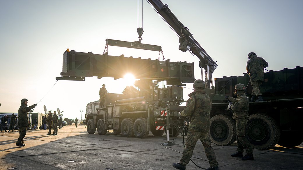 NATO troops unload missiles and components for the US Patriot air-defense system at Rzeszow Airport in Poland, a major hub for military aid to Ukraine, Jan. 23, 2025. Getty Images/Kay Nietfeld