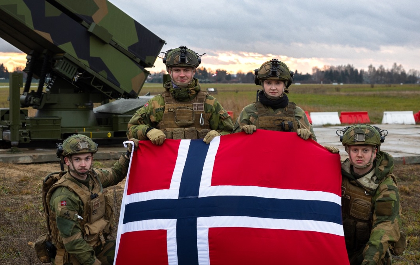 Norwegian military personnel in front of a NASAMS air defense system. Photo credits: Norwegian Ministry of Defense