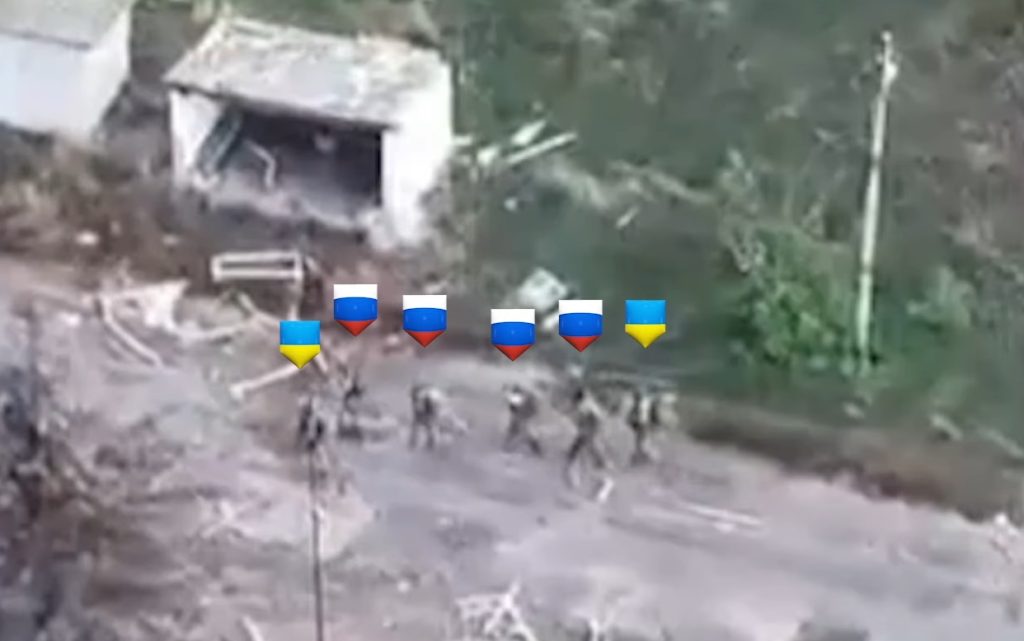 Ukrainian assault troops and Russian prisoners during an operation in the village of Torske. October 2025. Photo credits: 425th Skala Separate Assault Regiment
