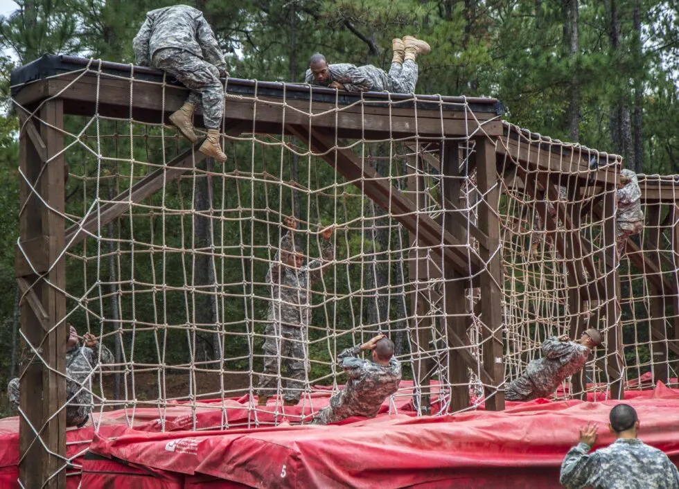 US Army recruits run through an obstacle course during training. Photo from open sources