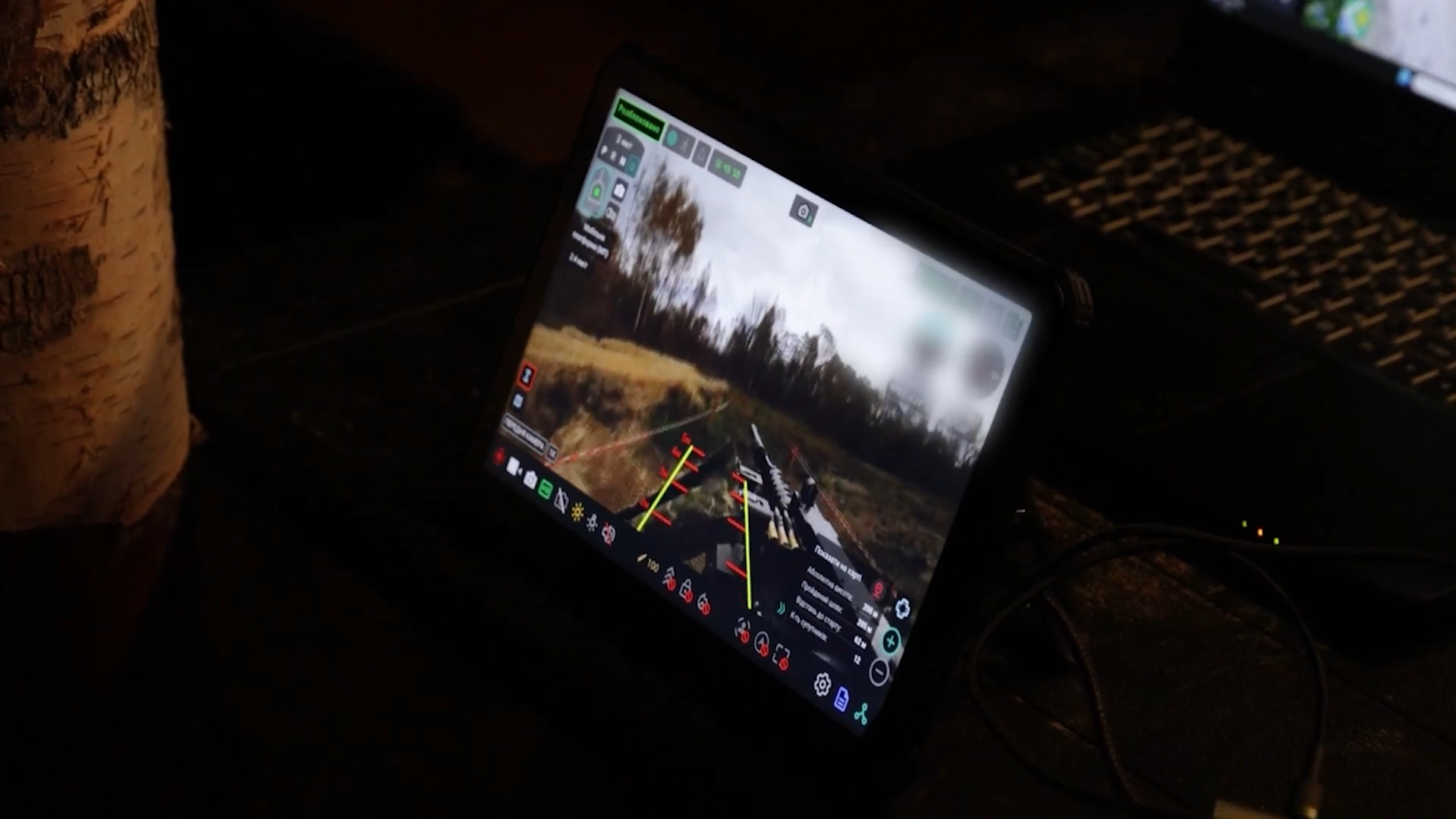 The operator controls the Droid TW 12.7. Freeze frame from a DevDroid video