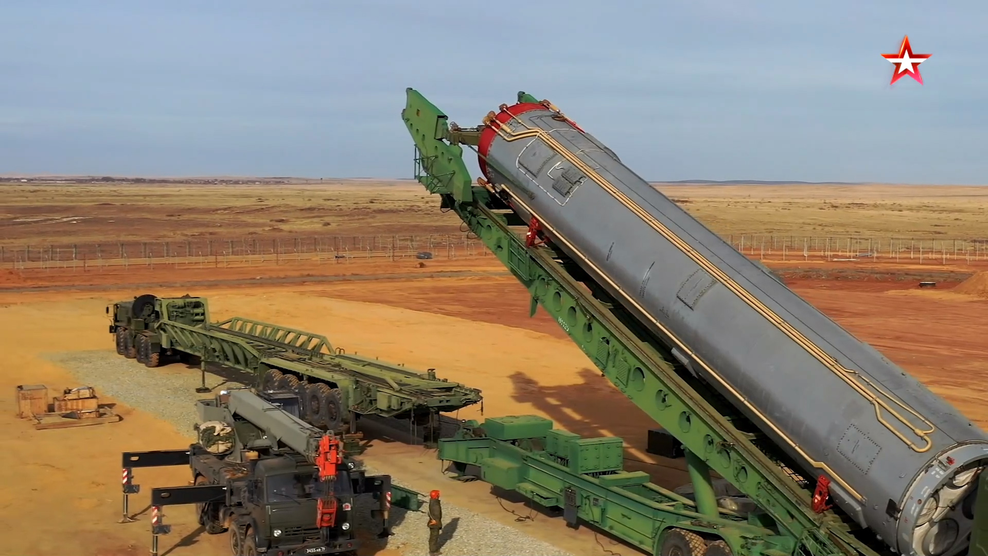 Loading an UR-100N ICBM warhead into the silo of the Avangard missile system, Yasny, 2020. Freeze frame from the video of the Russian Defense Ministry