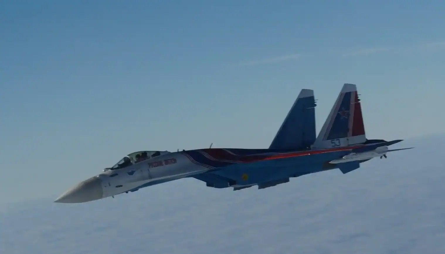 A Su-35S from the Russian Knights aerobatic team escorting a Tu-95 over the Barents Sea. Photo credits: Norwegian Armed Forces