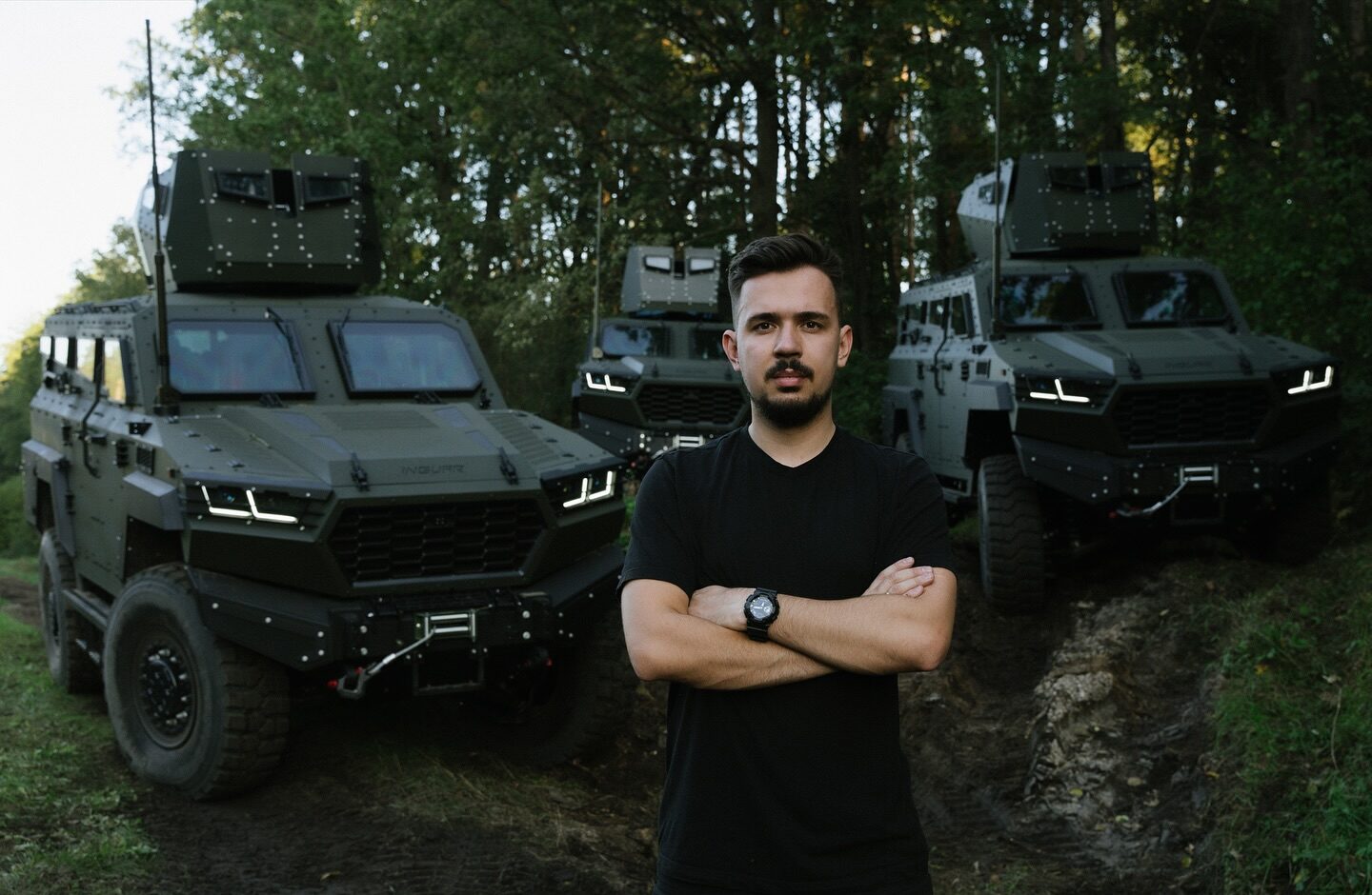 Artem Yushchuk, Executive Director and co-founder of Inguar, next to Inguar-3 armored vehicles, September 2025