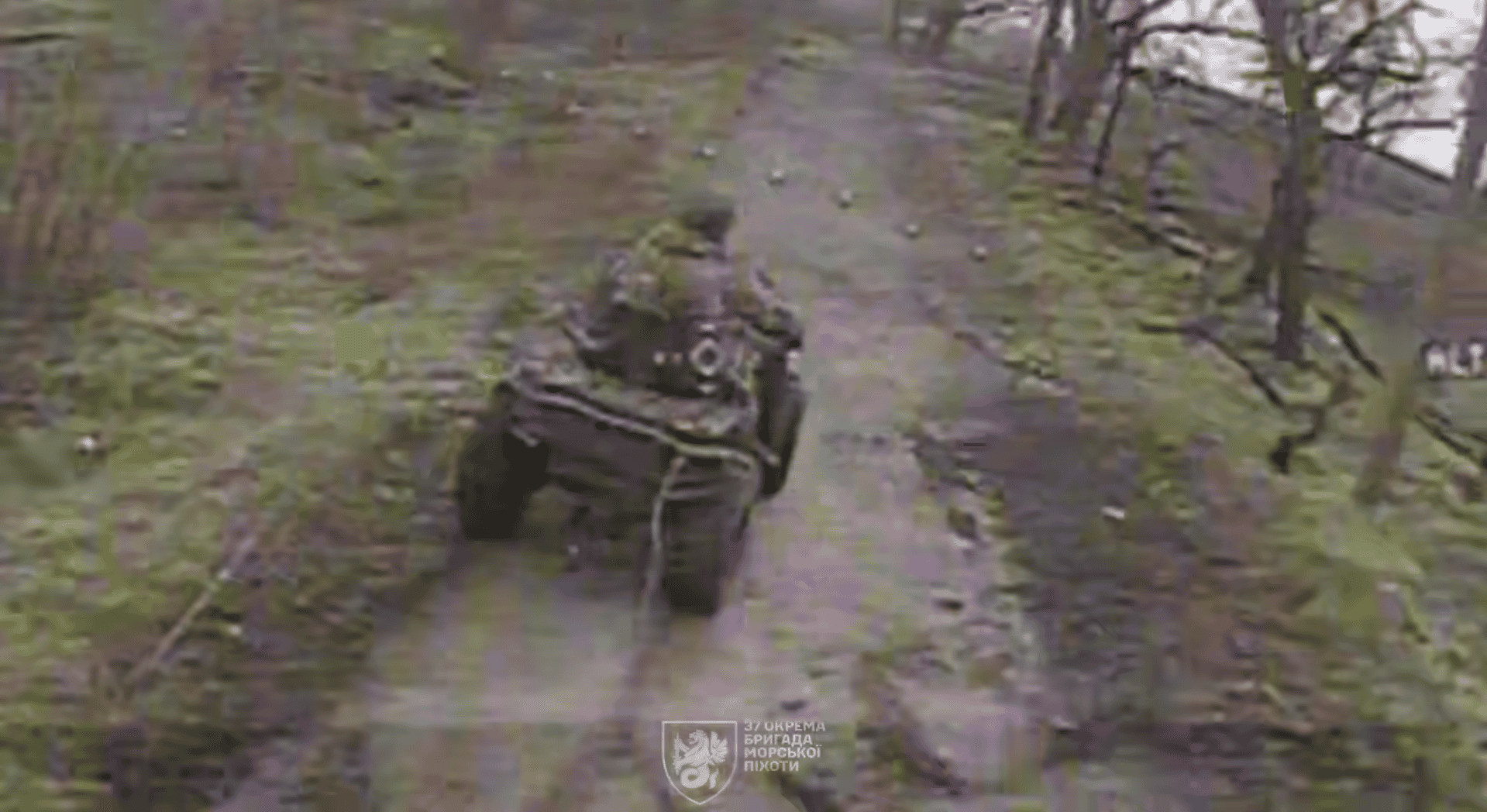 A Russian assault soldier on an ATV moments before being hit. Screenshot from a video by the 37th Brigade