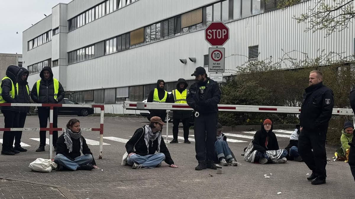 Berlin Activists Glue Themselves to Road Near Rheinmetall Factory