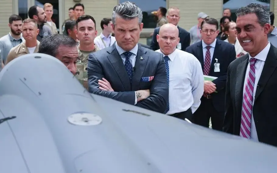 US Secretary of War Pete Hegseth watches a Low-Cost Unmanned Combat Attack System (LUCAS) drone during an event at the Pentagon in July 2025. US Army