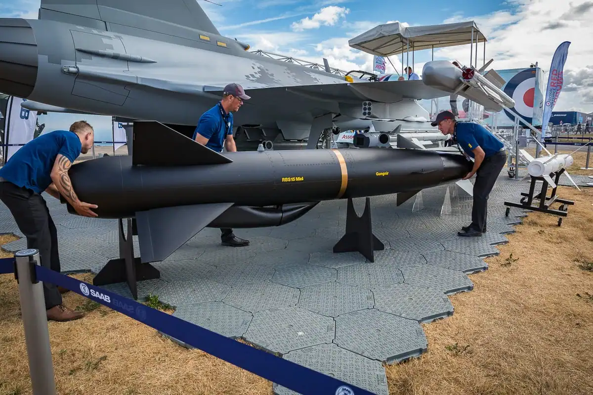 An RBS15 Mk4 anti-ship missile being mounted on a Saab Gripen E fighter jet. Photo credits: James Williams / Staff