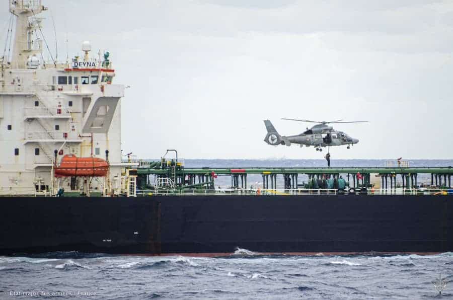 A French military helicopter during an operation against the tanker Deyna in the Mediterranean Sea. Photo credits: Prefecture maritime / EMA / Reuters