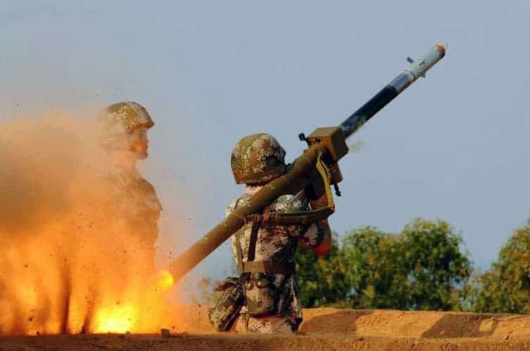 A Chinese soldier fires an FN-6 MANPADS