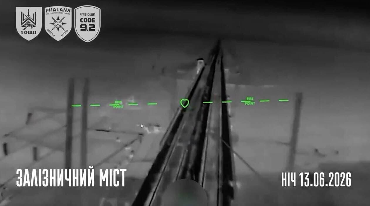 Still frame showing the destruction of a railway bridge. Video: 1st Separate Assault Regiment