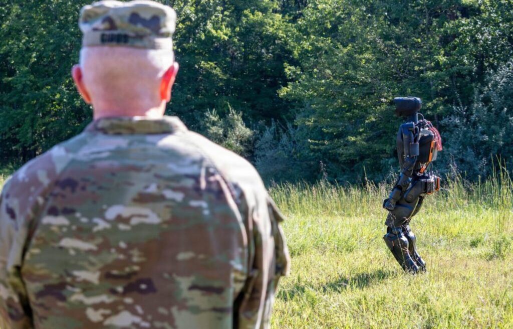 A soldier observes the field evaluation of Alex, a humanoid robotic system developed by the Florida Institute for Human & Machine Cognition during the xTechHumanoid competition. September 2026. Photo credits: pit.army.mil
