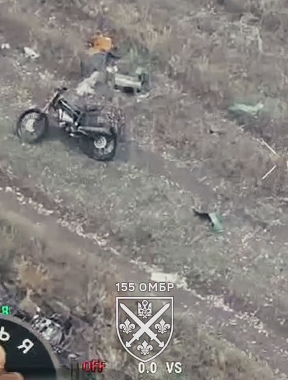 A Russian soldier’s motorcycle after being struck by a Ukrainian drone. Screenshot from a video by the 155th Mechanized Brigade.